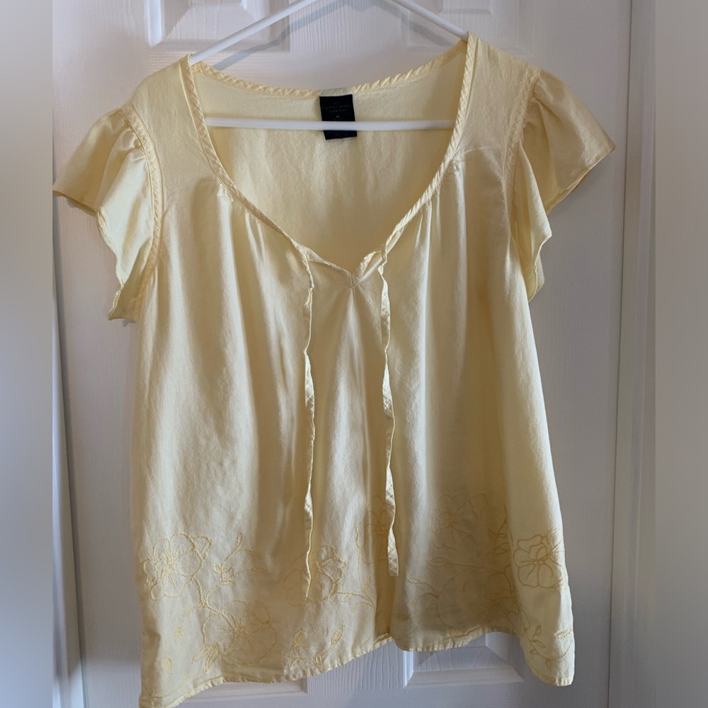 Cutest yellow women’s shirt.